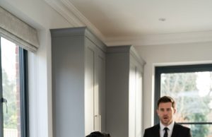 Hoping to see a giant smile, a loving father sneaked into his house early to surprise his little boy. Instead, his heart shattered when he walked into the living room and found his son crying hysterically in another woman’s arms.
