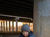 A nine-year-old boy living under a Phoenix overpass begged his mother not to send a starving Pit Bull to a shelter. The eleven words he whispered that freezing October night are the reason all three of them finally have a roof over their heads tonight.